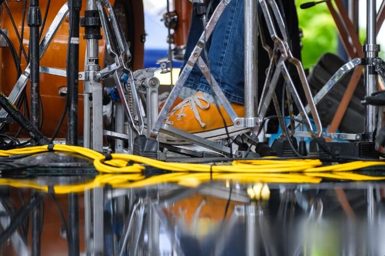 Heavy rains pool on the street and stage at the 10th Annual Craft Beer Festival in Mt. Pleasant on Saturday, June 8, 2024.