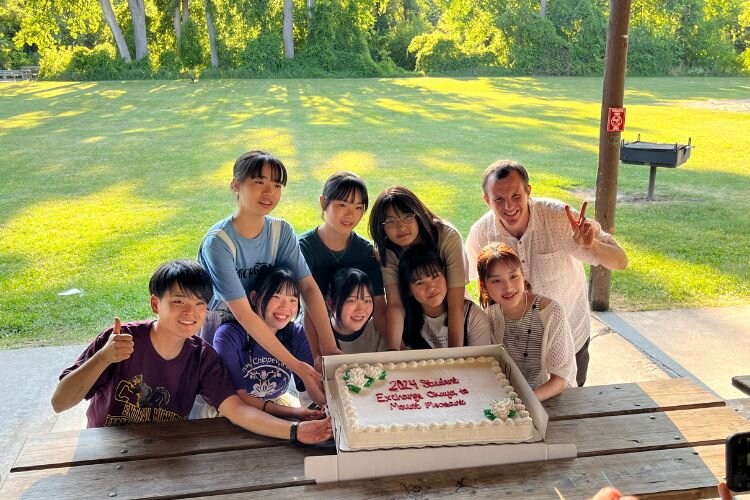 Students and chaperones from Japan at a going-away picnic.