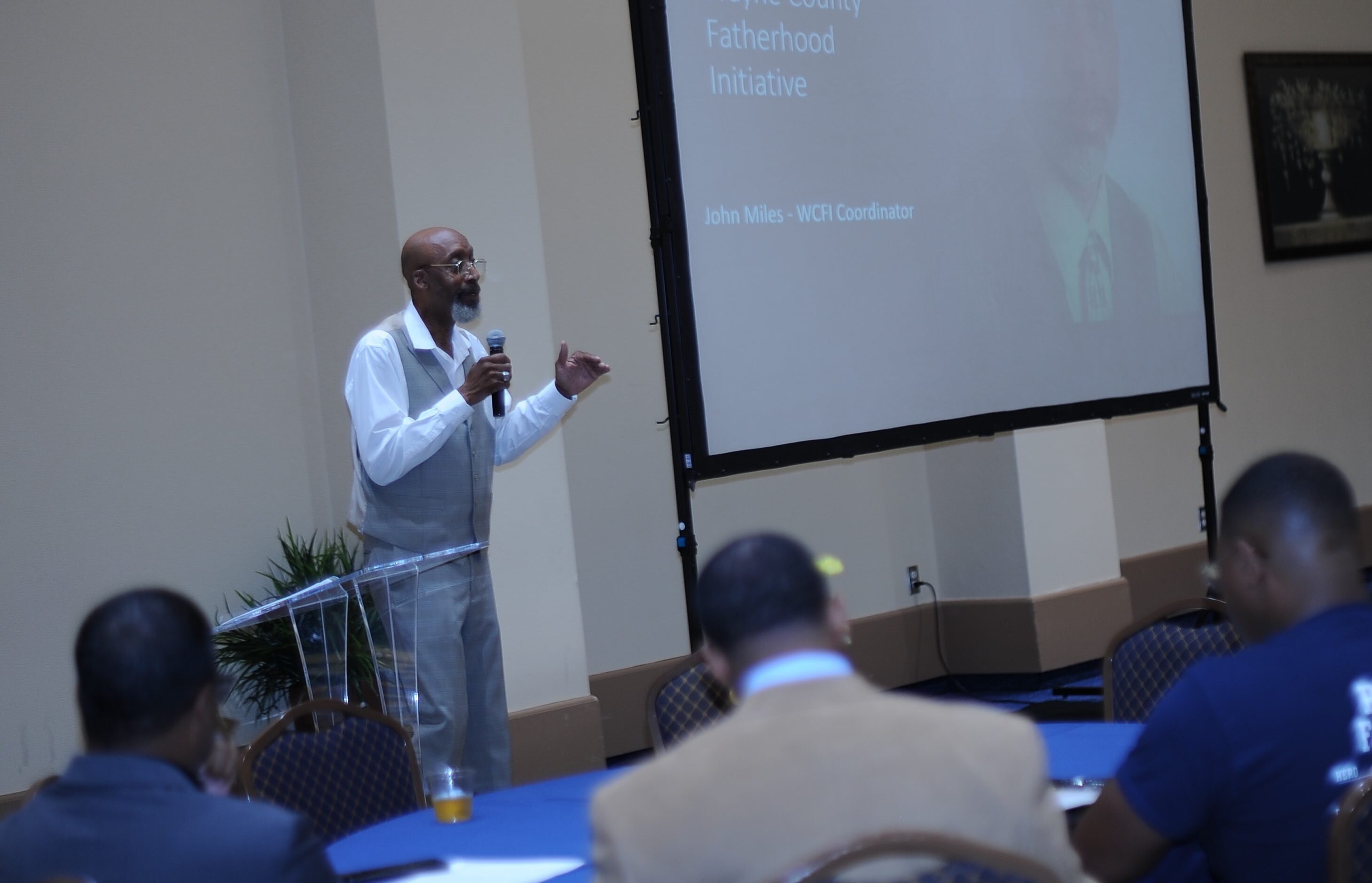 John Miles speaks in June at an annual Fatherhood Forum sponsored by the Detroit Wayne Integrated Health Network