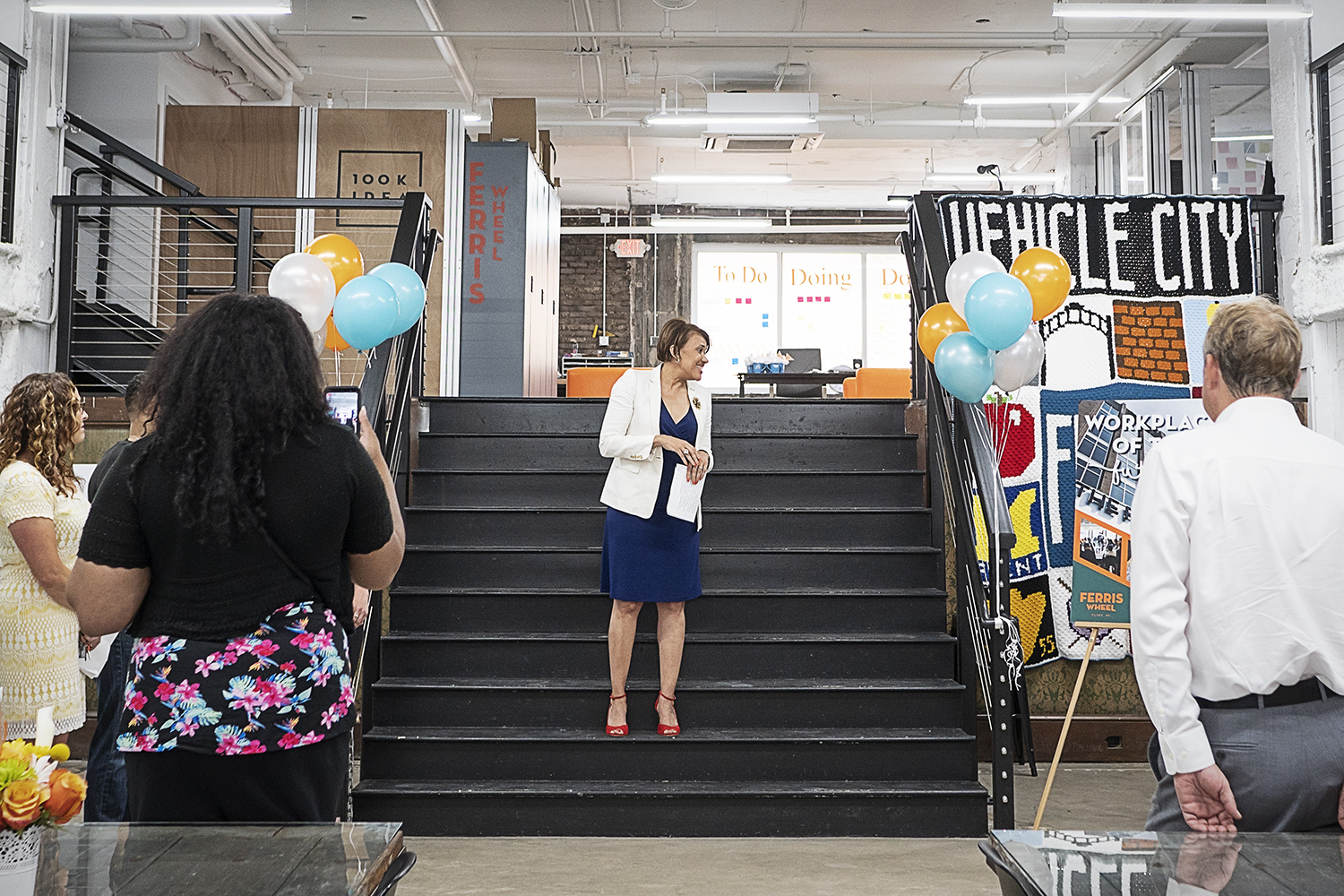 Flint, MI - Thursday, June 22, 2018: Flint Mayor Karen Weaver speaks to the audience during the move-in party at The Ferris Wheel in Downtown Flint.