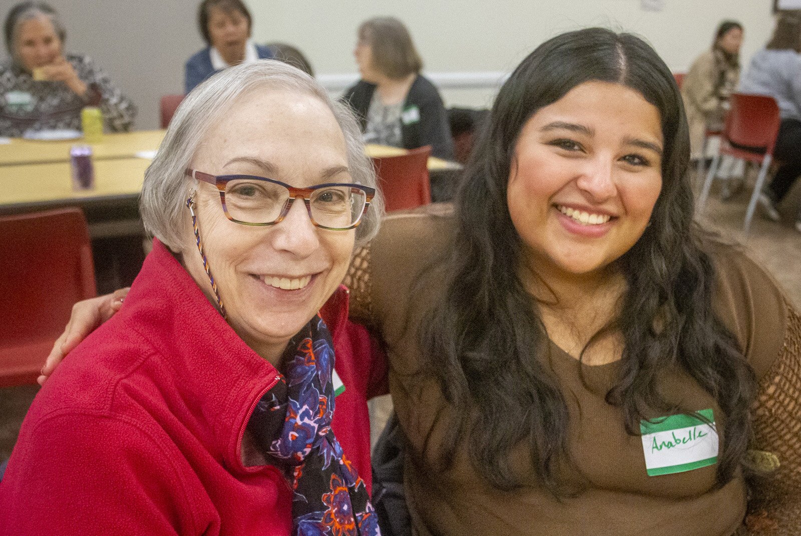 A gathering for Michigan State University's Generations Connect program, which matches MSU undergraduate students with elders in the community, at the East Lansing Public Library.