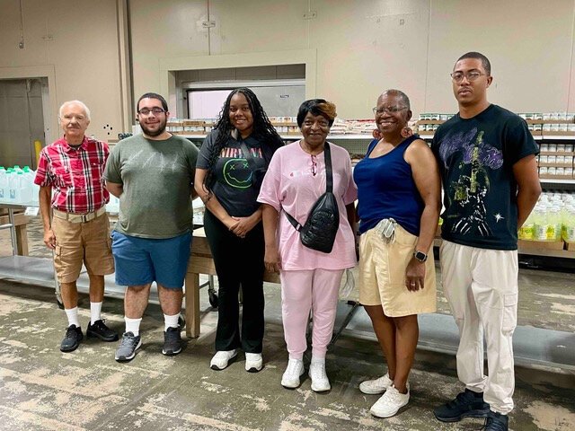 Client Choice Market volunteers (L to R) Chris Mead, Frank Bizze, Skylar Parrish, Freda Smith, Jeanne Franklin, and Paige Williams II