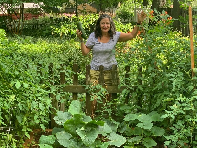 Michelle Bombe in her garden at her home in Laketown Township. 