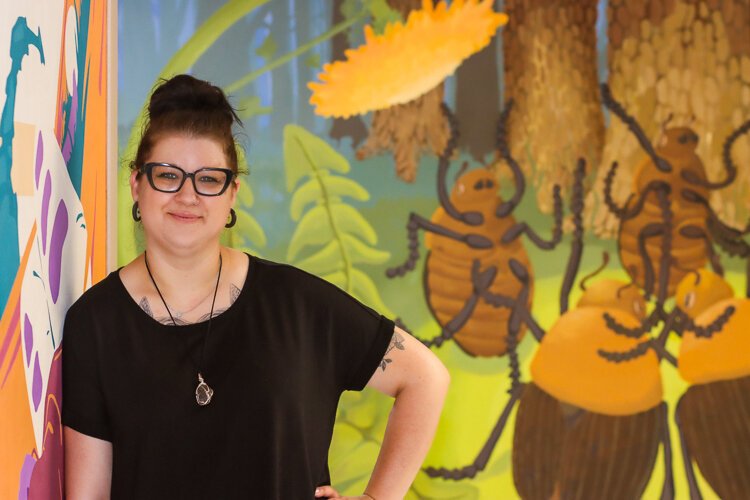 Devin DuMond's dual roles as an artist and educator underscore their commitment to nurturing talent while leaving a lasting impact on the community through public art.