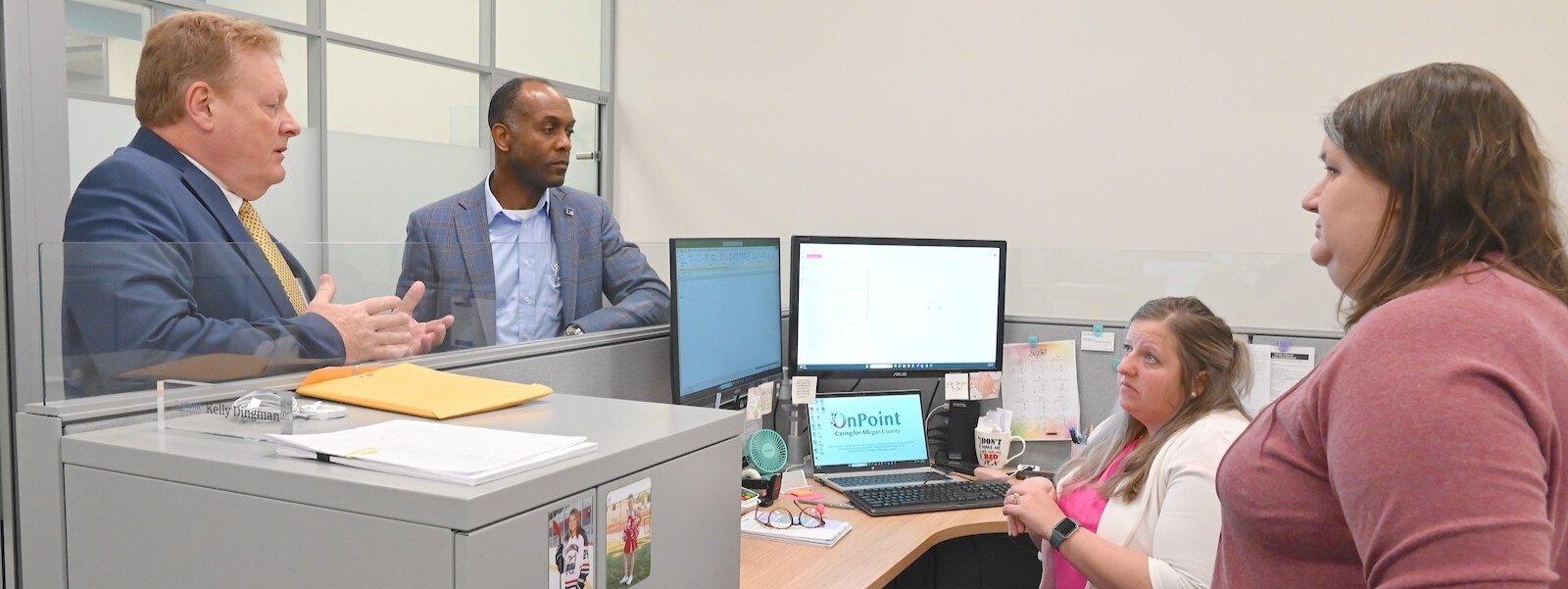 OnPoint staff, from left: Mark Witte CEO, Andre Pierre, Jr., CAO, and from accounting, Kelly Dingman and Sarah Lumbert.