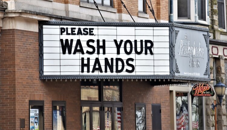 The Knickerbocker Theatre promotes a safety tip on its marquee.