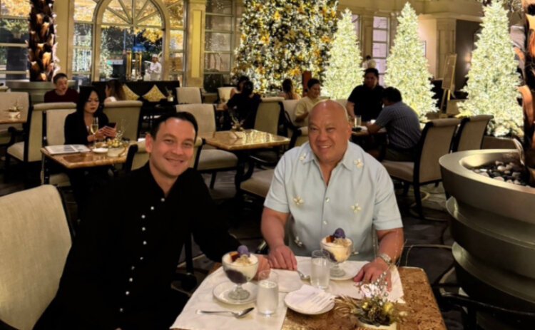 Holland AI entrepreneur Charles Elwood and George Aquino, President of Ayayaland Hotels and Resorts having Halo Halo dessert at the Peninsula Hotel in Manila.