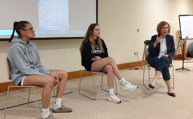 Evergreen Commons President and CEO Jill Ver Steeg, right, led a Q&A with Miss Basketball Michigan Gabby Reynolds, left, and her West Ottawa teammate Taylor Catton.