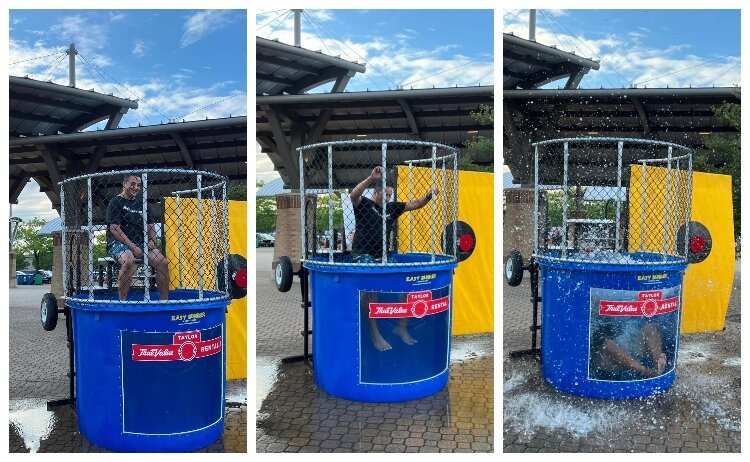 Gentex team members took turns working the dunk tank. (Downtown Holland)