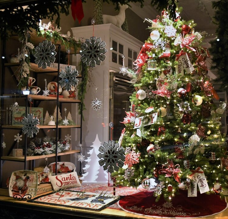 A storefront window display in downtown Holland exudes the spirit of Christmas.