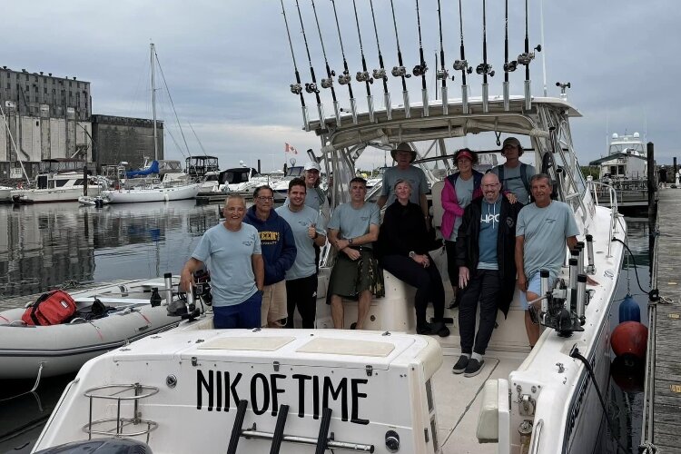 Bryan Huffman with the team that helped with his Lake Erie swim.