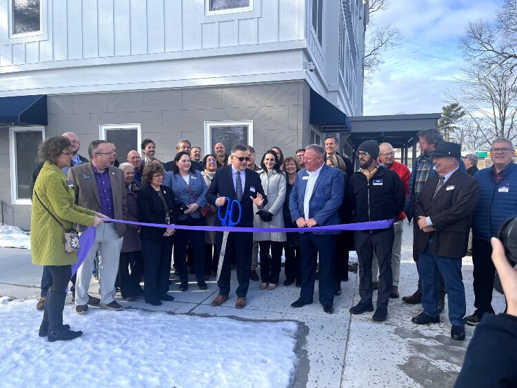 Officials cut the ribbon, opening at The Landing at Spring Lake.