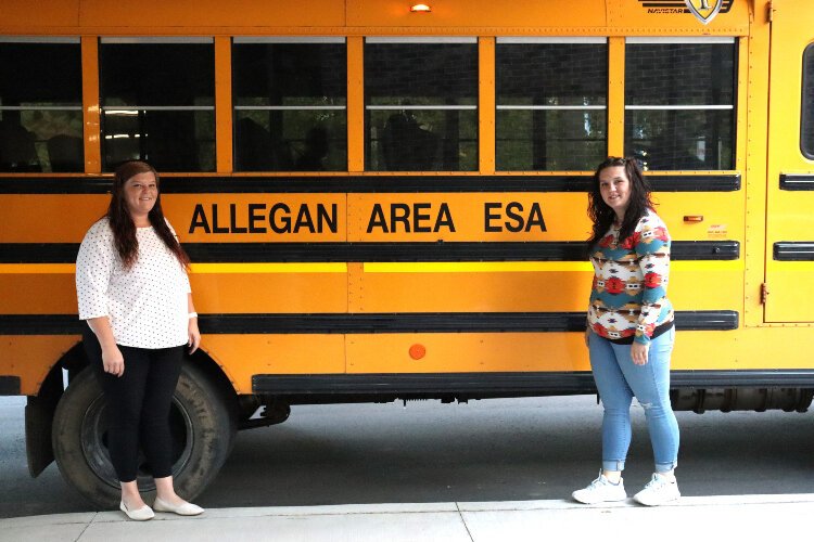 Sisters Emily and Chelsy Millner drive school bus for Allegan Area Educational Services Agency.