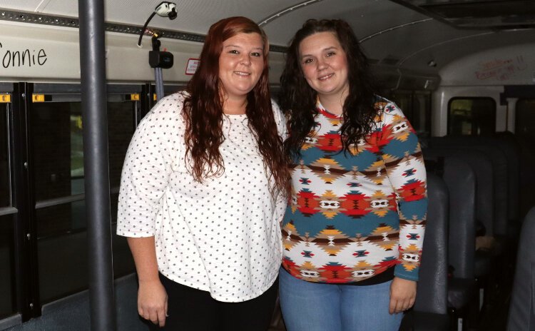 Sisters Emily and Chelsy Millner drive school bus for Allegan Area Educational Services Agency.