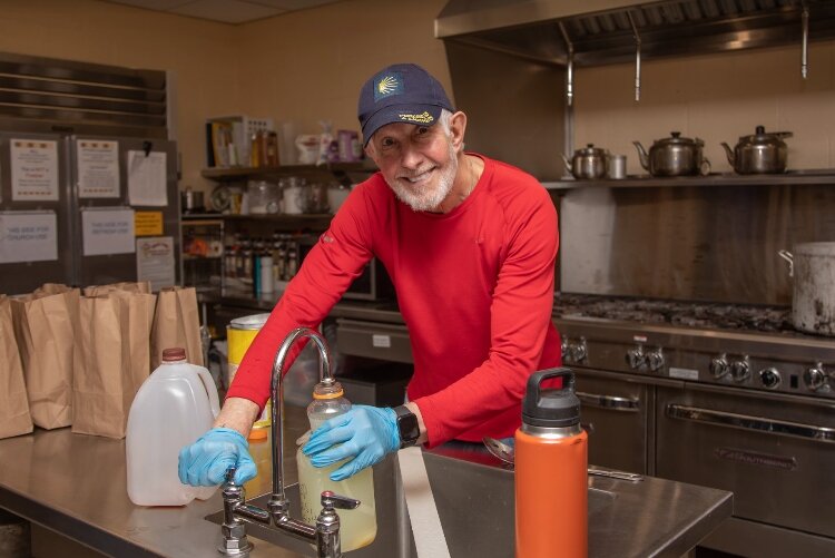 Refresh Volunteer preparing food in FUMC Kitchen.