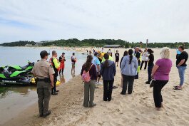 West Michigan Water Safety Alliance volunteers recently trained to distribute education about water safety at Holland State Park.