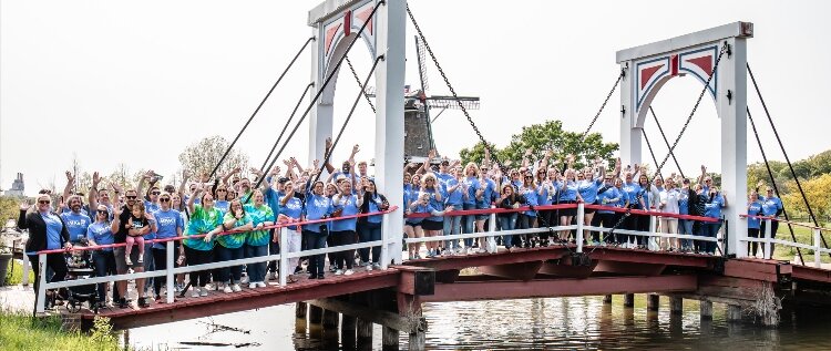 Volunteers at Windmill Island during a Community Impact Day.