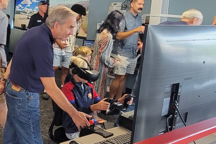 Attendees had an opportunity to try out flight simulators from FlightPath. (Boileau & Co)