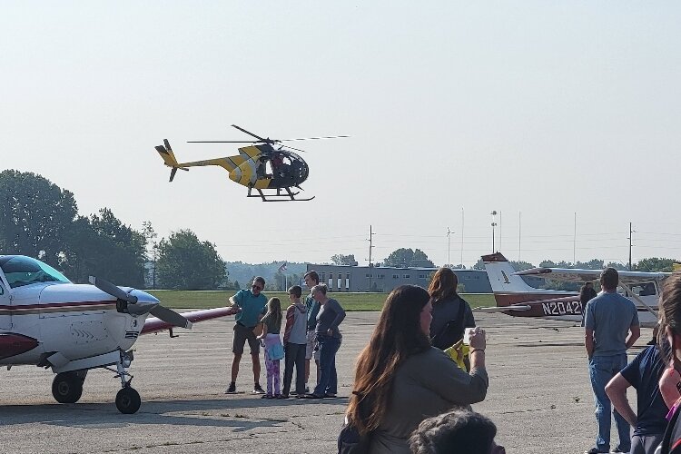 Attendees had an opportunity to see a helicopter up close. (Boileau & Co)