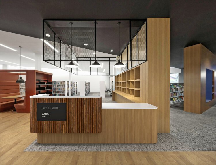 A library reception desk designed by The Worden Company.