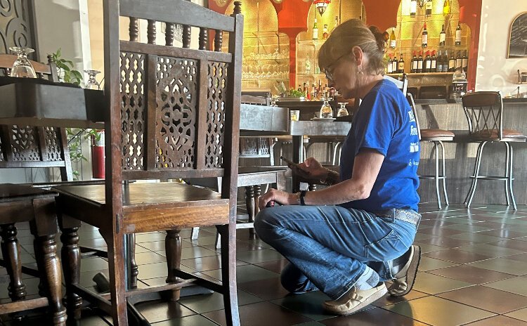 Disability Network Southwest Michigan’s Kelly Linton, an ADA specialist and systems advocate working with Wheel the World, takes measurements.