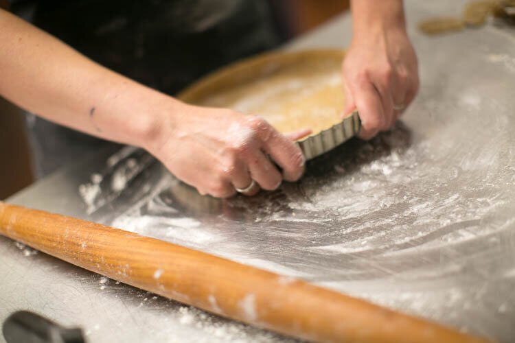 Kristin Conger prepares pastry in the commissary kitchen at Doug's Delights.