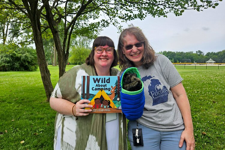 Librarians Melissa Connolly (left) and Shari Fesko are apart of the library collective that hosts Pages in the Park