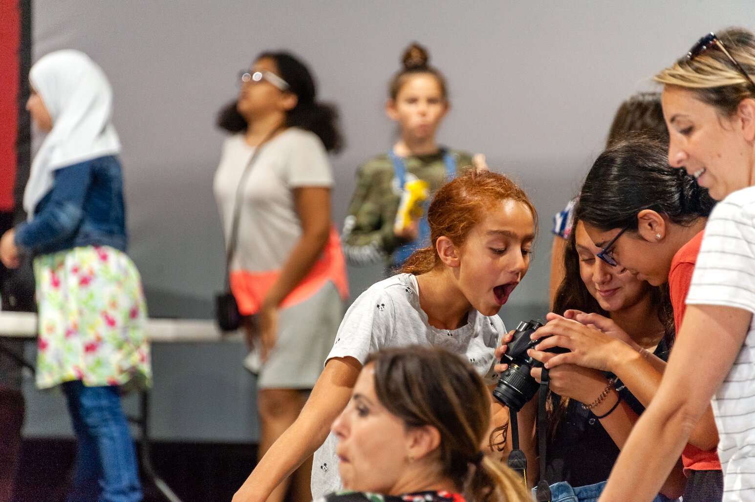 SURA students learning photography in Dearborn. Photo by Timothy J. Seppala