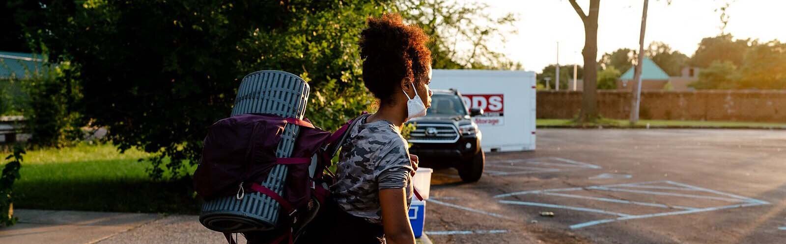 A camper returns from a Detroit Outdoors camping trip to Pictured Rocks.