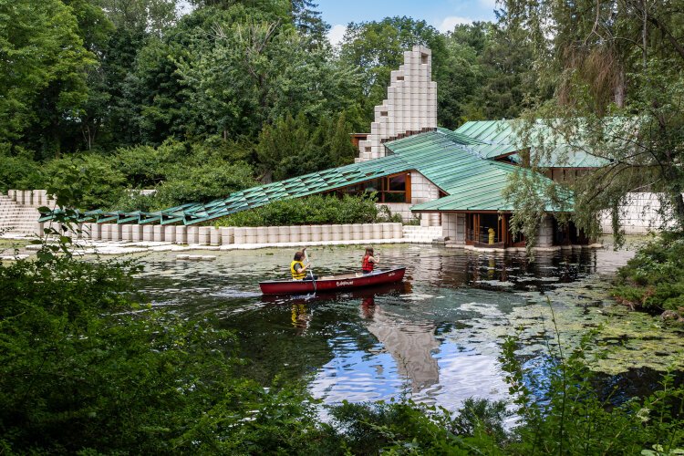 Participants enjoy a canoeing around Alden B. Dow House