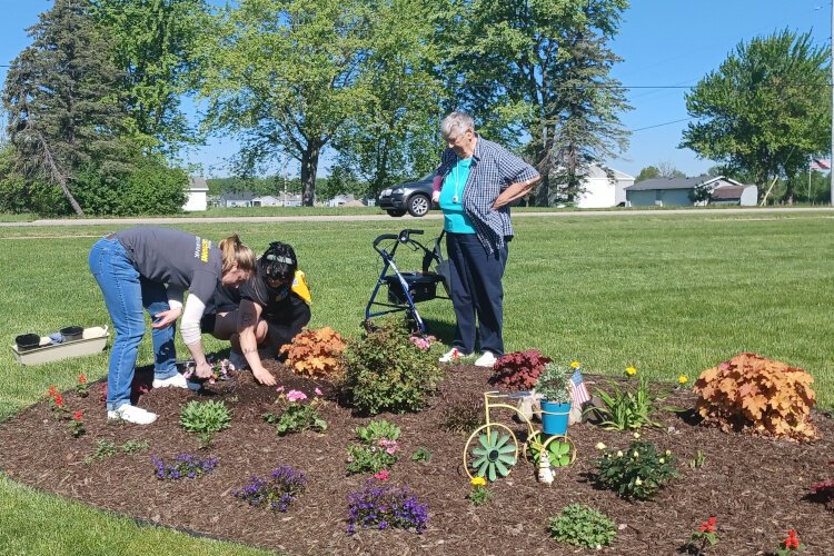 Resident Jean Method oversees planting at Primrose Retirement Community