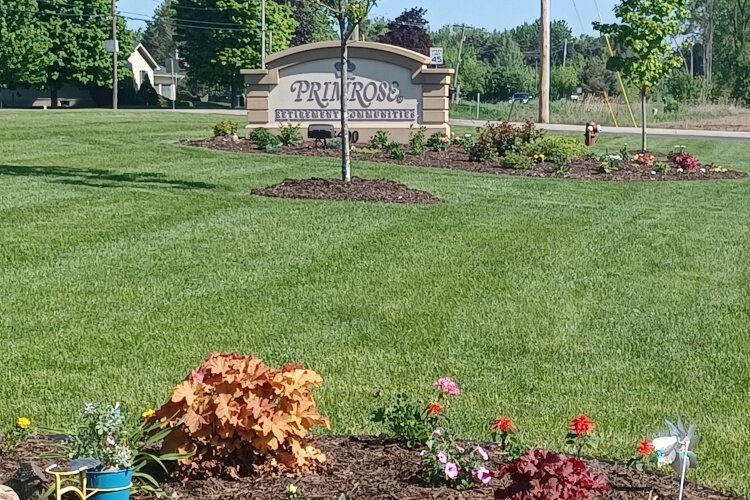 Entrance flowers planted by Isabella Bank and other community volunteers.