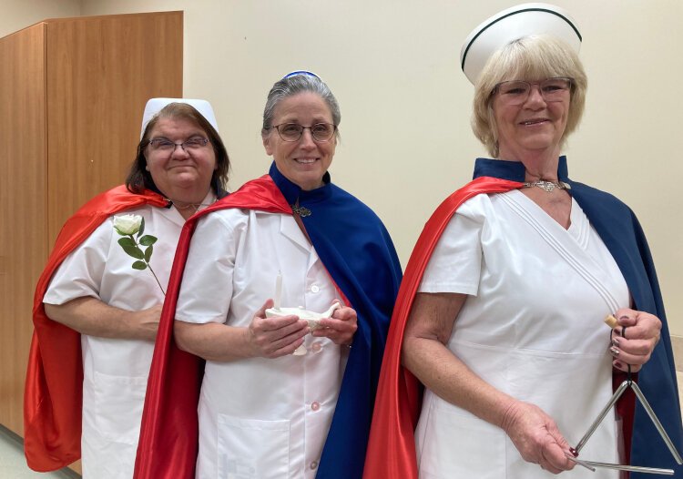  Guard members Rose Lange, Professor of Nursing at Saginaw Valley State University; Joyce Cook, Senior Simulation Specialist in the MyMichigan Educational and Specialist Development Department; and Carol Phinney, retired RN.