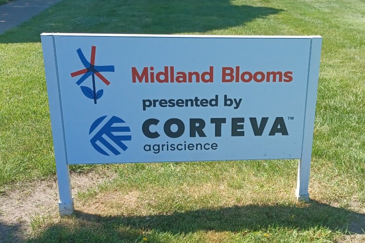 Corteva Agriscience is a premier sponsor of Midland Blooms program, with a unique logo displayed along Eastman Avenue throughout the summer.