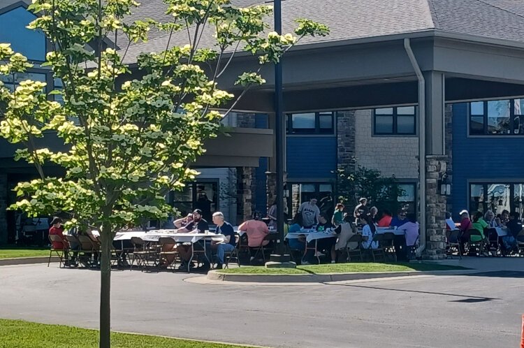 Volunteers gather after the 2024 Midland Blooms for a pancake breakfast hosted at Primrose Retirement