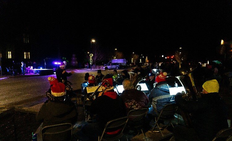 The Mid Michigan Brass Band fills the streets with smooth, orchestral Christmas music.