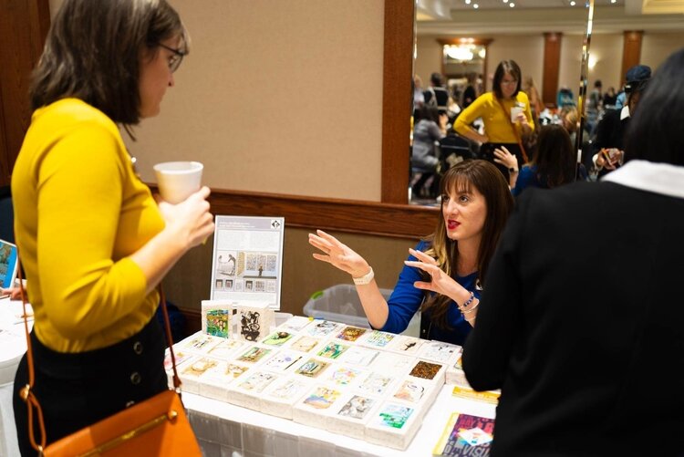 Tara Welch of Studio 23 in Bay City talks to guests.