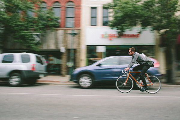 Nate Elkins of Influence Design Forum commutes to work by bike to his office at SPACE in downtown Traverse City. / Beth Price