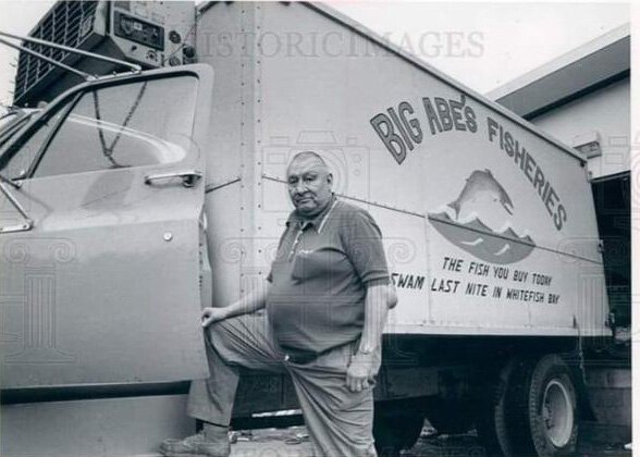 Big Abe LeBlanc in front of the truck he used to deliver fresh fish to customers. 