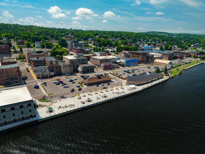 Transformed waterfront shows the new pier, wide sidewalks, parking, and open air for walking traffic.