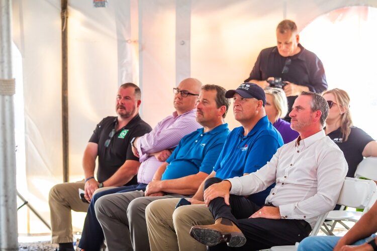 From left, Monitor Township Supervisor Terry Spencer and Bay Future President Jim Reaume sit with Michigan Sugar President Neil Juhnke, Director of Communications Rob Clark, and Co-Op Board Chairman Jim Roggenbuck.