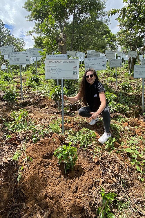 Rachael Odish, owner of Pivot Roasters, poses for a photo in June 2024 while planting coffee at Hacienda La Minita, a coffee producer in Costa Rica.