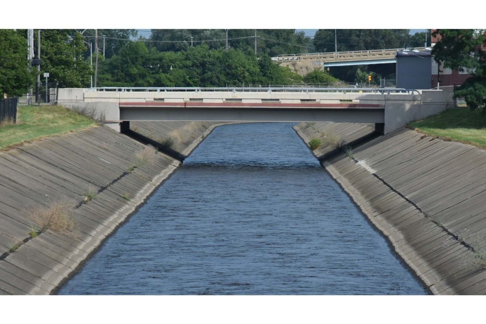 The Kalamazoo River flows westward parallel to Dickman Road south of downtown Battle Creek.