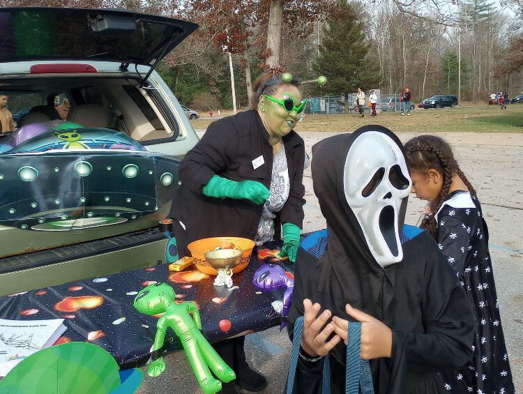 Meresa Salisbury attends a trunk or treat event in Baldwin.