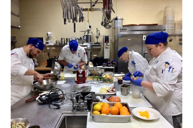 Students prepping in the kitchen at the Great Lakes Culinary Institute.