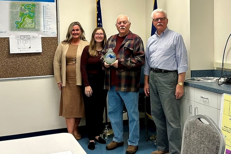 Community leaders in the Village of Baldwin celebrate as the latest Michigan community to achieve "Redevelopment Ready" designation.