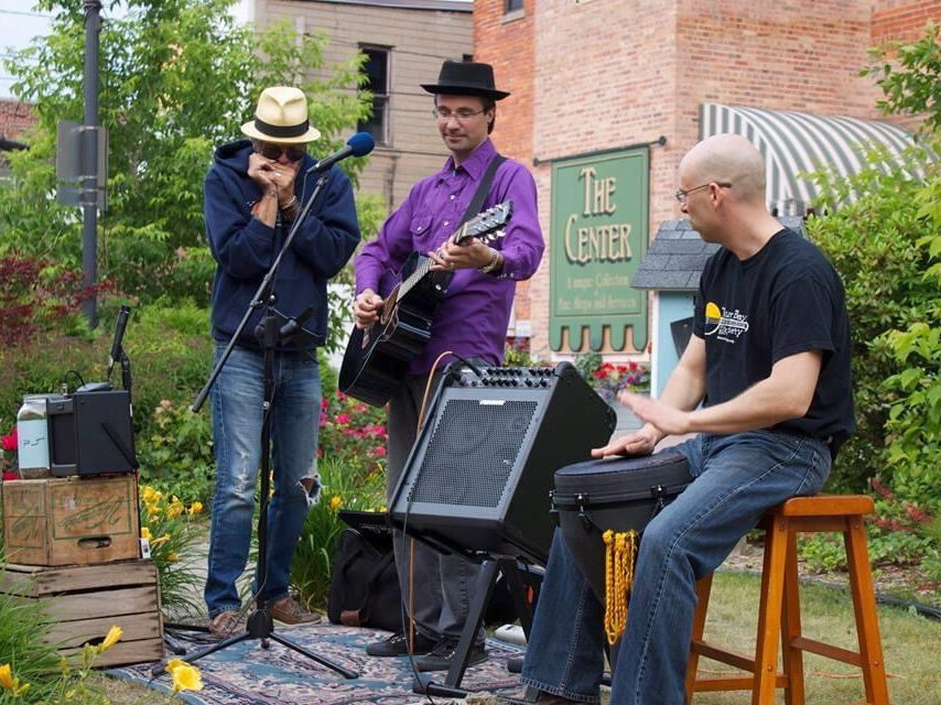 Lee Kitzman, Chris "Crown" Lawrence and Jeremy Smith performing at Pocket Park.