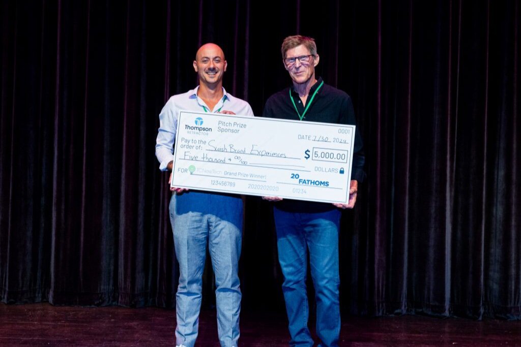 Adam Stave with Swish Brand Experiences accepts the First Place Award at the July 30 TCNewTech.