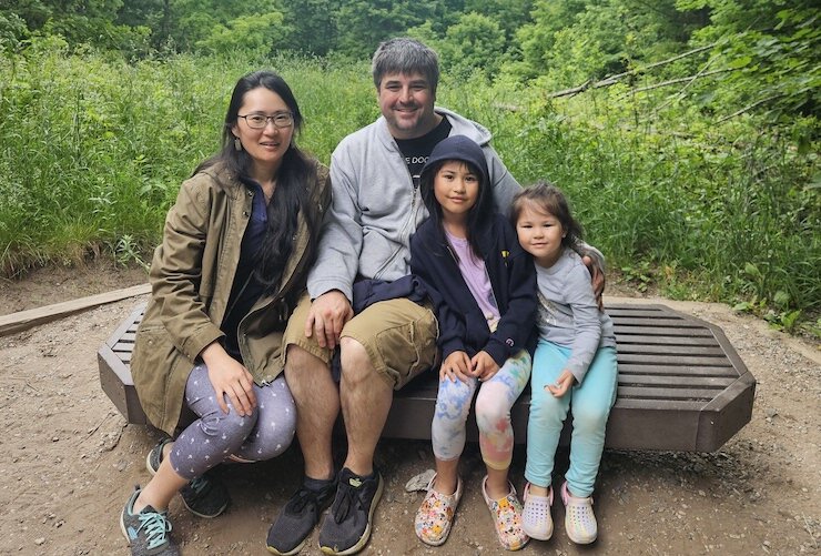 L. Sam Zhang, her husband, Michael Hypes, and daughters, Alexandra and Amilia.