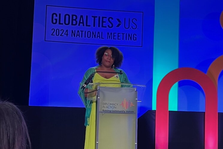 Janine Branch speaking at a Global Ties Summit.